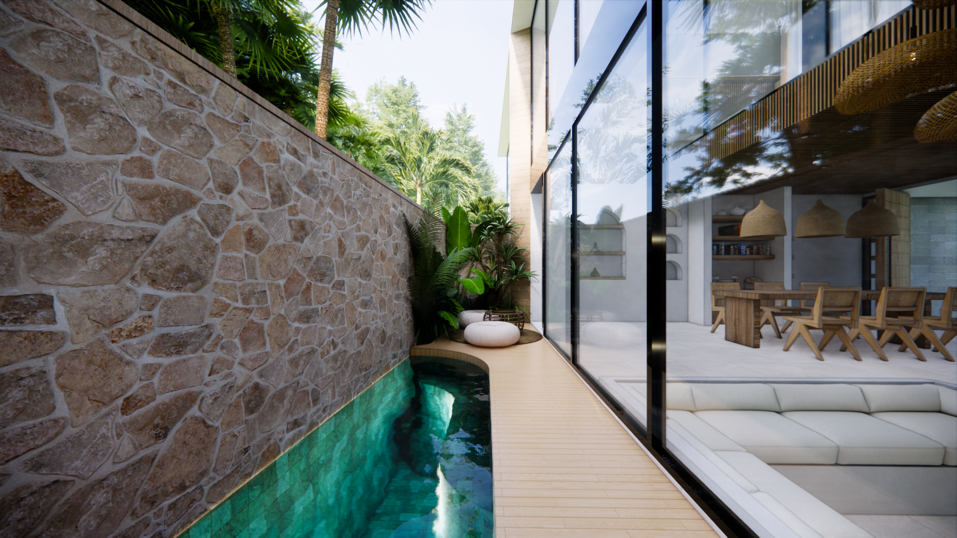 Private plunge pool at dusk with mature tropical planting and forest beyond